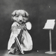 Illustration for article titled Even In The 1900s, Humans Were Obsessed With Photos Of Dogs In Clothes